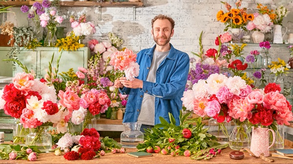 Florist work pretty and arranging floral decorations