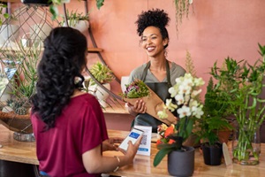 Photo of selling bouquet to a customer